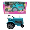 Muñeca con tractor y accesorios, en caja
