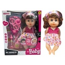 Muñeca con accesorios, hace pis, en caja