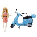 Muñeca con moto en caja