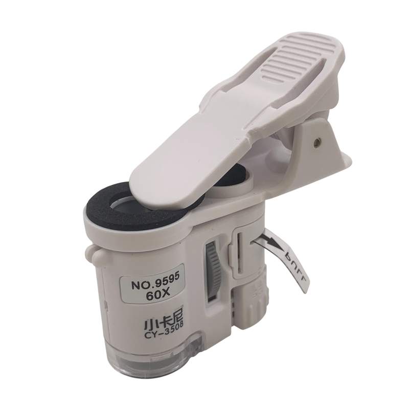 Microscopio de mano con clip, luz LED y UV, 60 aumentos, en caja