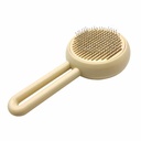 Cepillo para mascotas de plástico con botón de fácil limpieza, en caja varios colores